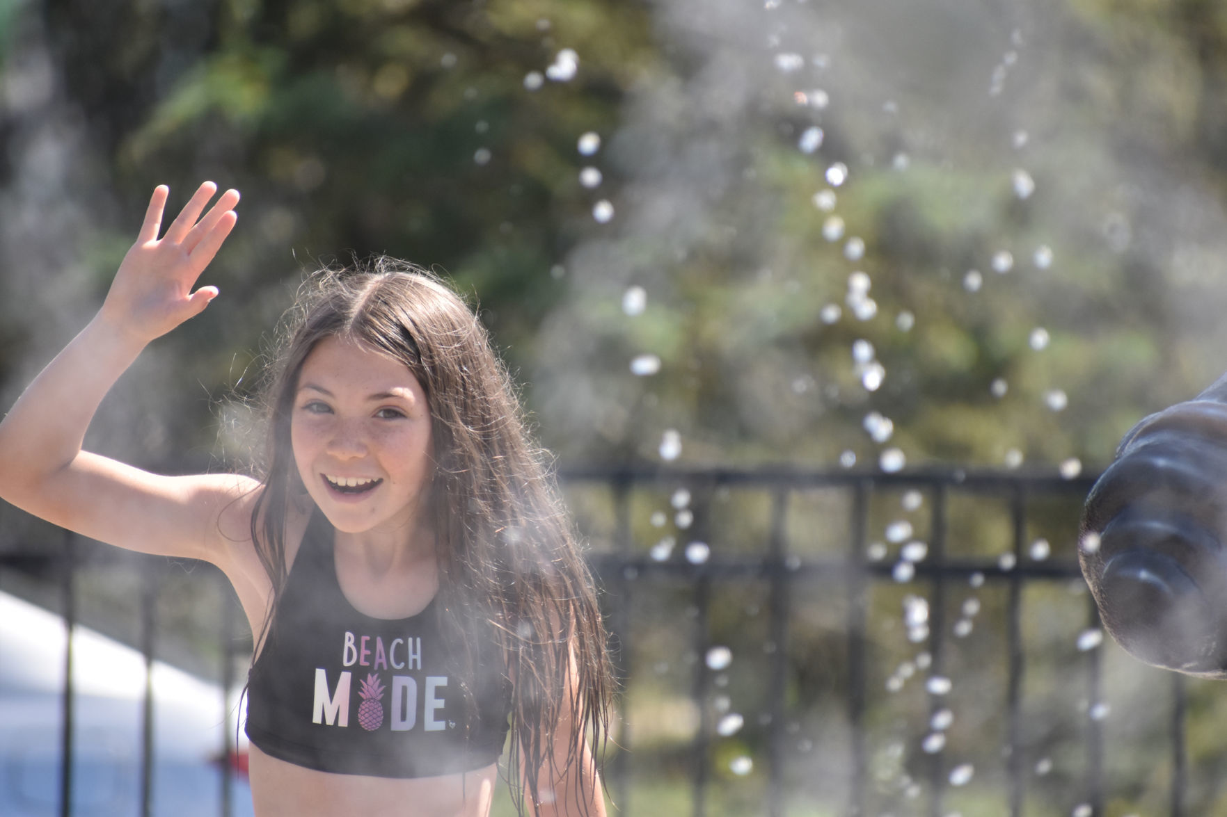 Jaelyn waves to her friends